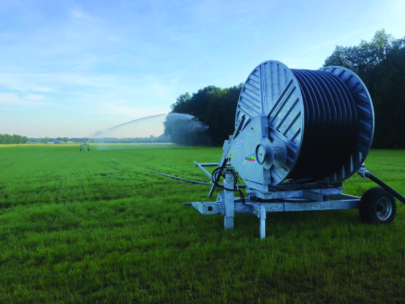 ON A FARM DIVIDED UP INTO MANY FIELDS, THE HOSE REEL IS MORE APPROPRIATE BECAUSE IT IS EASILY MOVED BETWEEN FIELDS WITH THE TRACTOR.
